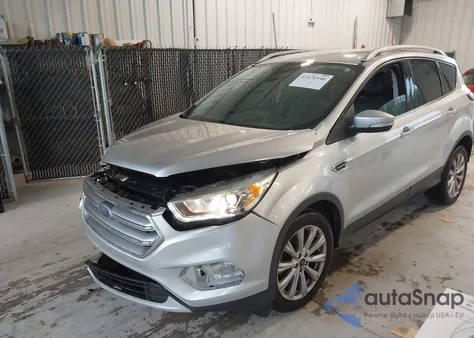 2017 Ford Escape Titanium z USA, uszkodzony, nr VIN 1FMCU9JD3HUD37432